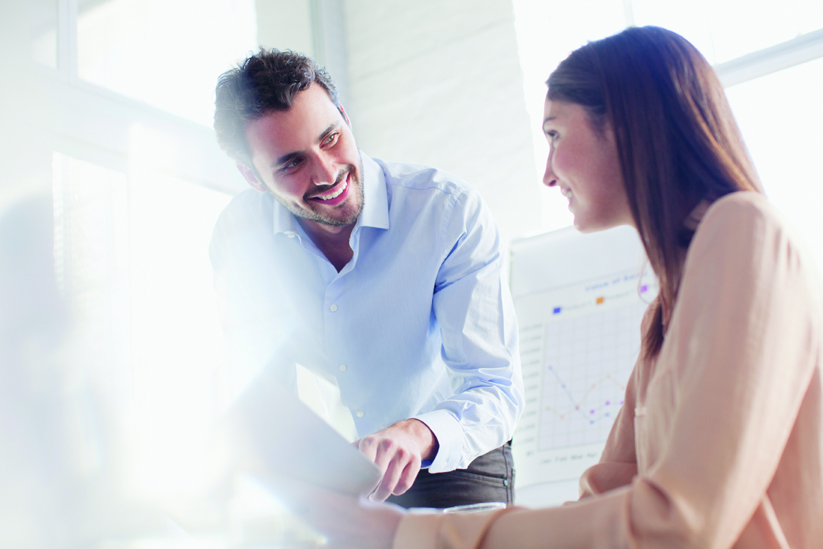 man-and-woman-talking-in-office-1200x800.jpg